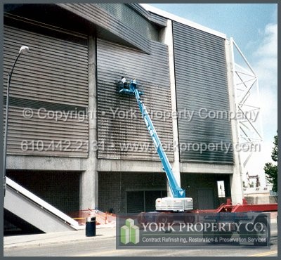 Degraded stainless steel corrugated cladding restoration cleaning.
