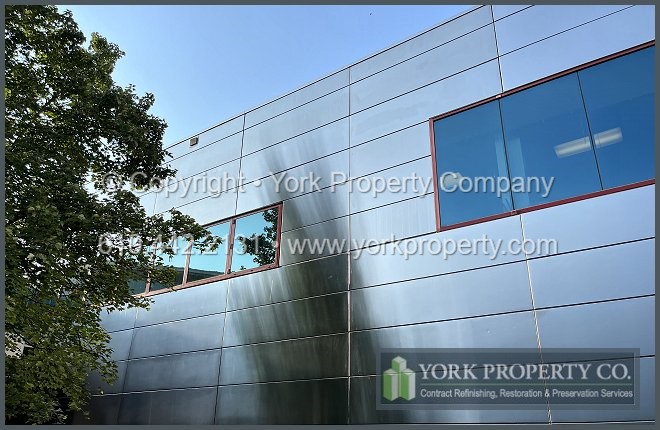 We are a company that takes pride in cleaning dirty stainless steel building facade siding panels.