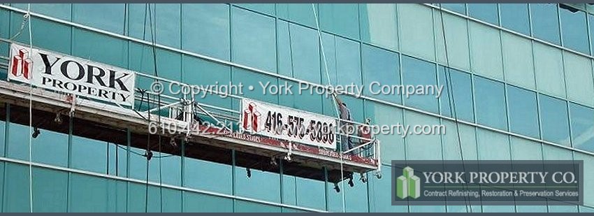 York Property Company's environmentally friendly, biodegradable and safe painted aluminum cleaning materials, products and chemicals clean, protect, refinish, paint, recondition, refurbish, repair, preserve and restore dingy, dull, deteriorated, fire / water / smoke damaged, acid / chemically etched, oxidized, hard water stained, old, aged, chalked, faded, stained and bleached paint finishes and painted aluminum surfaces. These paint finishes include painted aluminum siding, corrugated metal cladding, awnings, painted metal roofing, canopies, skylights, column covers, ground floor storefront window frames, entrance doors, sliding doors, revolving doors, balcony railings and extrusions.