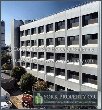 Anodized aluminum building facade restoration; brightening, renewing and reconditioning anodized aluminum.