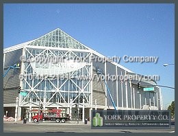 Stainless steel restoration cleaning and refinishing of degraded, stained, dull and faded exterior stainless steel.