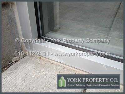 Cleaning anodized aluminum window frames from weathering and sun damage.