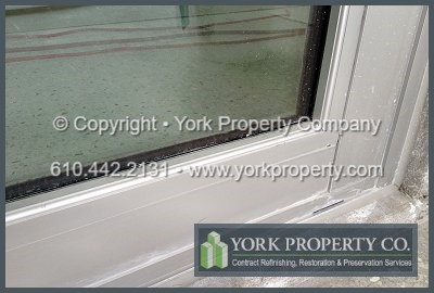 Clean acid etched clear anodized aluminum window frames, repair acid burns on anodized aluminum window frames.