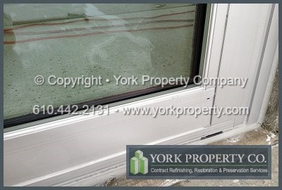 We clean acid etched anodized aluminum window frames, refinish oxidized anodized aluminum panels, refurbish concrete damaged anodized aluminum, clean water damaged anodized aluminum, repair stucco stained anodized aluminum, recondition bleached anodized aluminum and restore hard water stained, scratched and damaged anodized aluminum window wall systems.