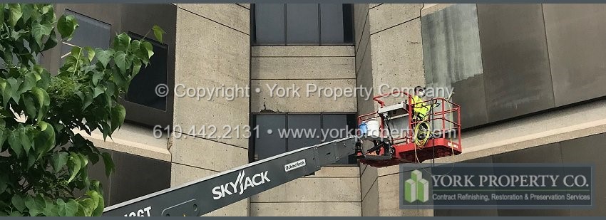 Cleaning dirty anodized aluminum building facade clad panels.