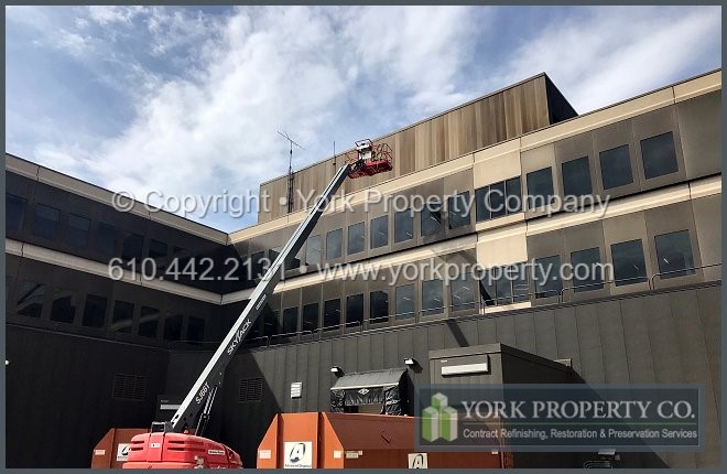 Company safely chemically stripping peeling lacquer from anodized aluminum panels.