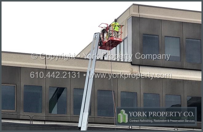 A company that repairs the eggshell finish on damaged exterior anodized aluminum facade siding panels.
