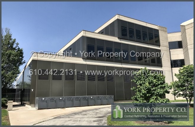 Local contractor that can refurbish the damaged finish on old bronze anodized aluminum panels.