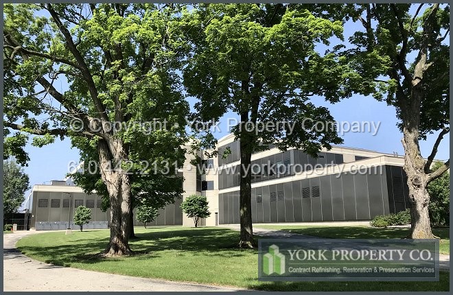 We restore the gloss and sheen to color faded anodized aluminum building facade panels.