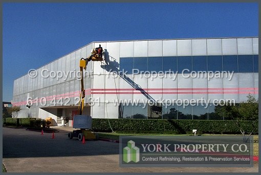 Anodized aluminum is damaged by biological and pollution stains; dirty window green chemical cleaning runoff and leeching and bleeding silicone caulking.