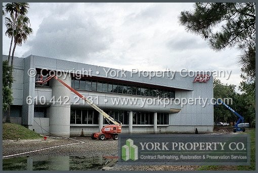 Stained anodized aluminum metal building panel chemical cleaning and professionally restoring scratched anodized aluminum.