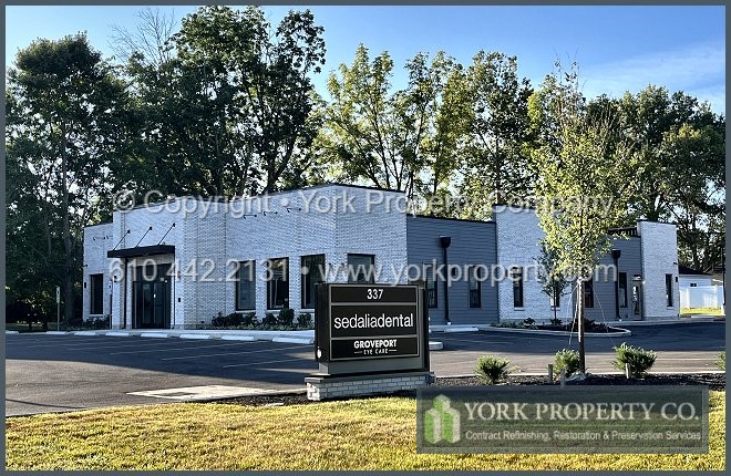 Restoring damaged bronze anodized aluminum door frames, refurbishing stained anodized aluminum and restoring acid etched anodized aluminum storefront window frames.