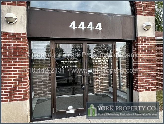 Premature bronze anodized aluminum finish failure on oxidized, deteriorated and corroded anodized aluminum panels required anodized aluminum cleaning and anodized aluminum restoration programs.