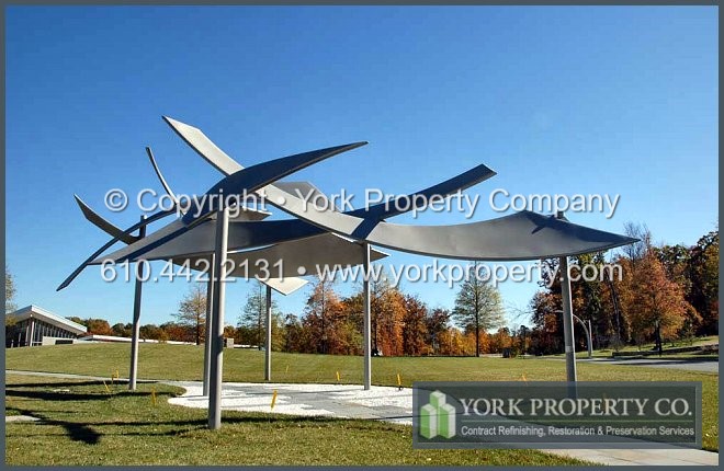 We get mineral stains off of stainless steel sculpture statues. We remove calcium and hard water stains from stainless steel sculpture finishes.