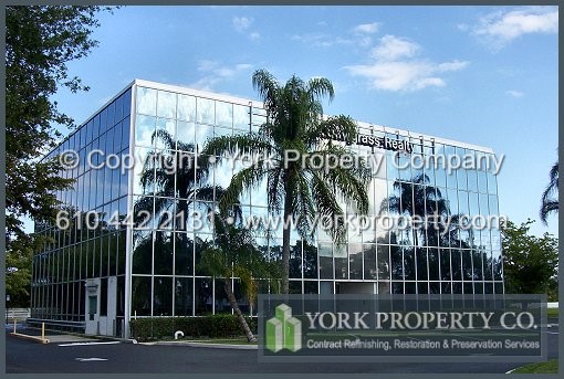 Exterior oxidized anodized aluminum window frame cleaning and scratched anodized aluminum window frame refinishing.