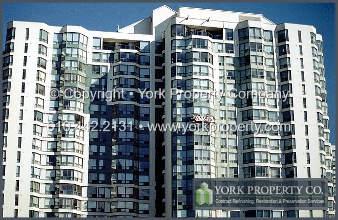 Protecting, preserving, sealing, refurbishing, painting, maintaining, repairing and refinishing painted aluminum curtain wall panels, balcony railings, sliding doors, ground floor storefront window frames and entrance doors.