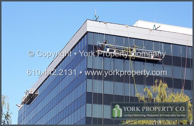 Protecting faded painted aluminum from caustic and corrosive damaging chemicals. Refurbishing and refinishing old, stained and and oxidized painted aluminum window frames.