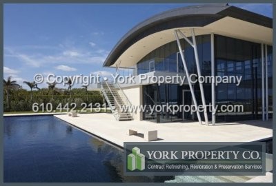 Oxidized, stained, iron oxide rust stained and pitting stainless steel cladding restoration. Stainless steel building facade siding cleaning chemicals and stainless steel maintenance.