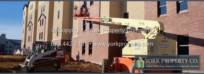 Repairing concrete acid etching on anodized aluminum window frames.