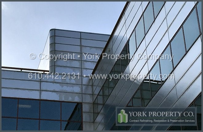 Dirty metal panel cleaning company.