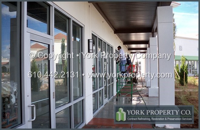 Restoring, cleaning and repairing concrete and mortar stained anodized aluminum. We refinish damaged, acid etched and oxidized anodized aluminum storefront window frames and anodized aluminum entrance doors.