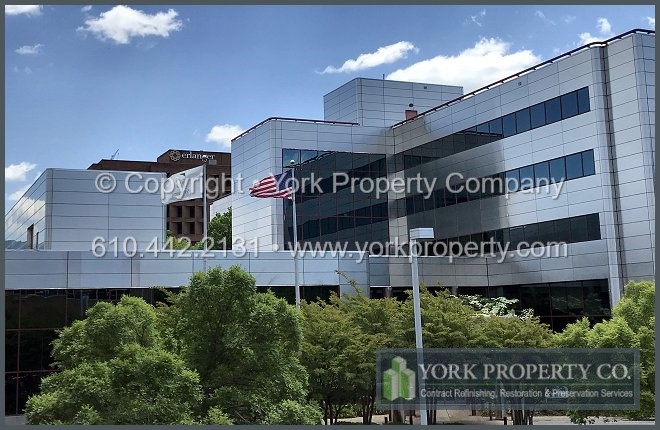 Company that washes dirty metal building facade panels.