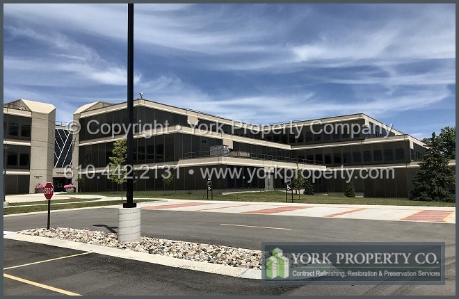 Gloss, color and sheen enhanced dark bronze anodized aluminum restoration.