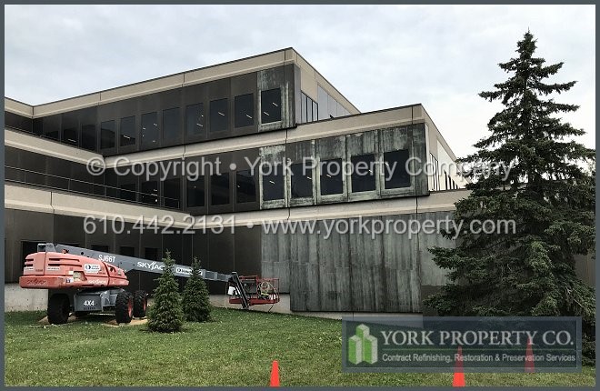 Local company that gets the finish restored on weathered anodized aluminum panels.