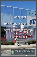 Faded, bleached, stained, oxidized, discolored, acid etched and pitted painted metal building facade / curtain wall cleaning, polishing, painting, maintaining, restoring, refinishing, maintenance and painted metal restoration.
