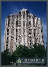 Painted metal curtain wall metal cladding refinishing and restoration with oxidation removal and clear protective coatings.